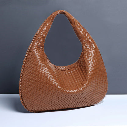 Petit sac à main femme avec surface texturée et fermeture éclair