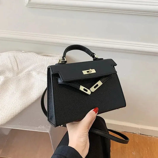 Sac bandoulière femme avec poignée rigide