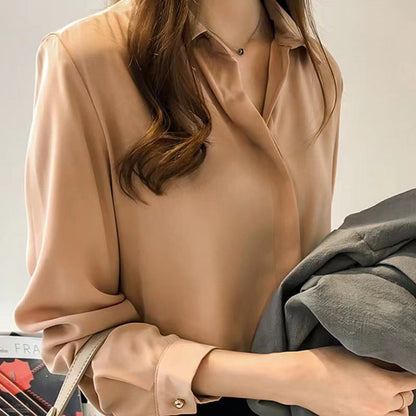 Blouse femme matière brillante à fermeture boutonnée