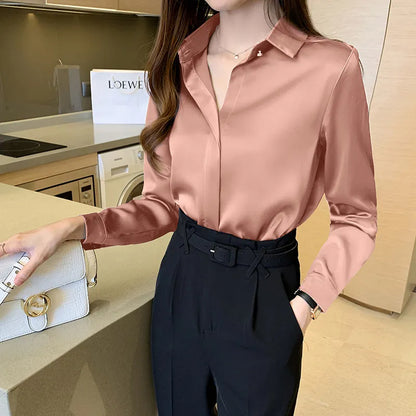 Blouse femme matière brillante à fermeture boutonnée