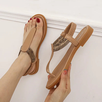 Sandales plates pour femme, finition tressée